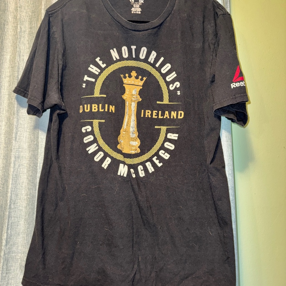Reebok Black and Gold Graphic Tee